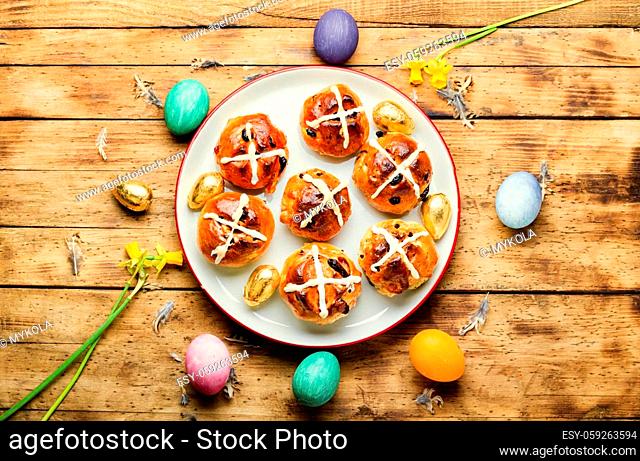 Easter hot cross buns and holiday decor.Easter baked goods
