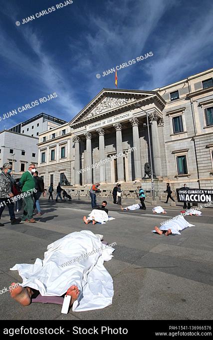 Madrid, Spain, 01/11/2020.- Extinction Rebellion exposes symbolic corpses in front of the Spanish Parliament in Madrid, coinciding with All Saints' Day