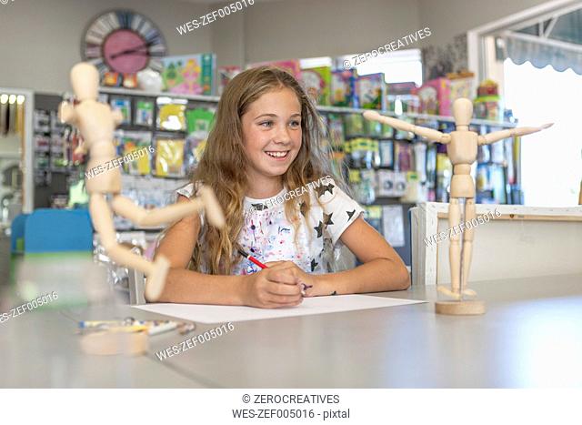 Portrait of smiling girl in an art class