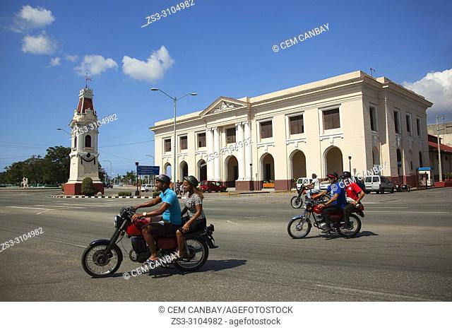 Motorcyclists in front of the Customs House-Aduana at Malecon, Santiago De Cuba, West Indies, Central America