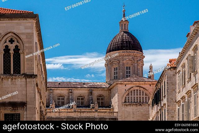 Statues and dome on cathedral church in the old town of Dubrovnik in Croatia