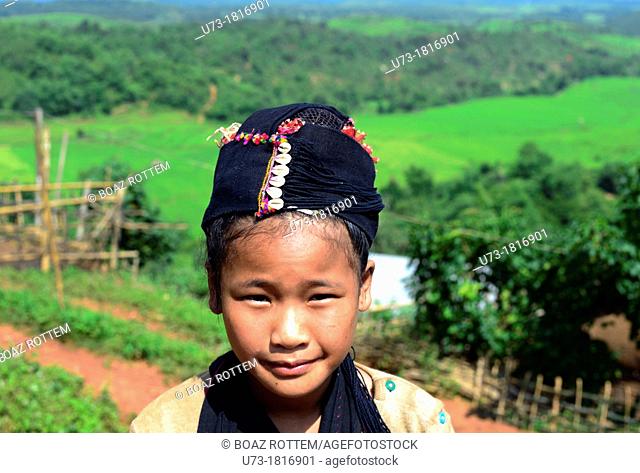 Portrait of a cute Ann girl taken in her remote village in Eastern Shan state in Myanmar