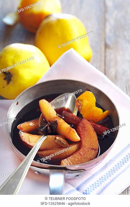 Quinces preserved in spiced red wine with star anise, cardamom, cinnamon and lemon