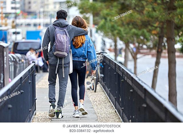 Couple of tourists visiting the city, Multiracial young couple, Donostia, San Sebastian, Gipuzkoa, Basque Country, Spain