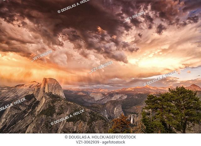 Dramatic Cloud Formation and thunderstorm over Half Dome at sunset