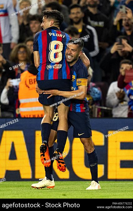 Jordi Alba (FC Barcelona) celebrates with his teammate Pedri (FC Barcelona) after scoring during La Liga football match between FC Barcelona and CA Osasuna