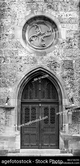 Door to the church St. Amandus, Bad Urach, Baden-Württemberg, Germany, Europe