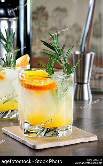 Chilled cocktail of vodka and tonic with the addition of freshly squeezed orange juice