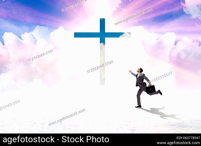 Religious concept with the cross and lonely man