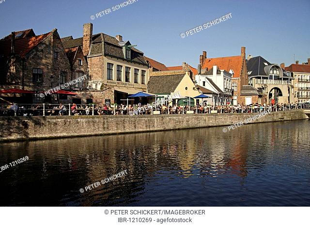 Restaurant and beer garden De Torre at a canal in the historic center of Bruges, Belgium, Europe