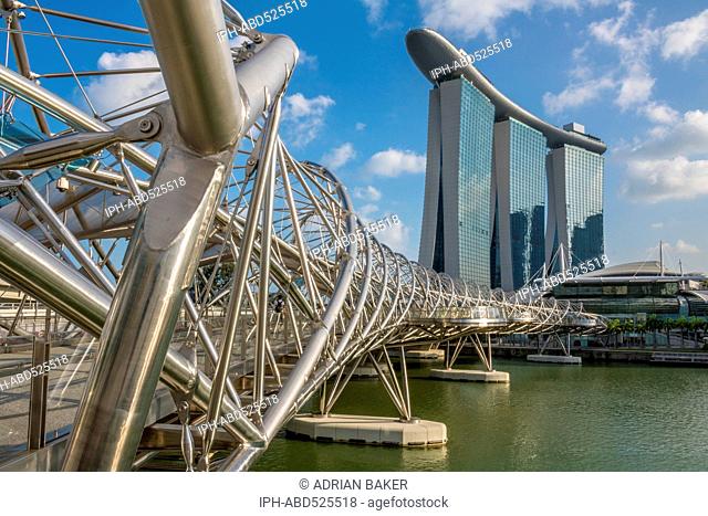 Singapore. The Helix Bridge and Marina Bay Sands Hotel and Casino