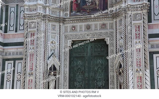 Exterior, TILT up, daylight, view of the main facade. Seen is the main portal from the beginning of the 20th century. Seen also is its lunette with a mosaic of...