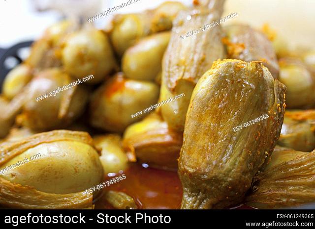 Almagro pickled eggplants. Delicious pickled snack displayed plastic basket
