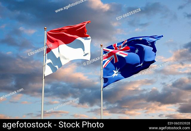 Beautiful national state flags of Monaco and Australia together at the sky background. 3D artwork concept