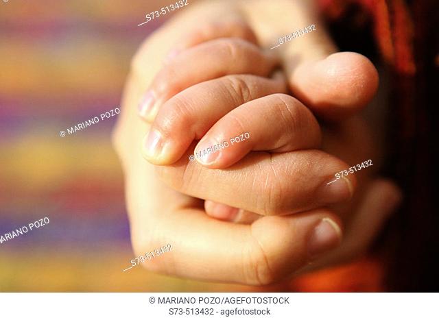 Mother and baby's hands
