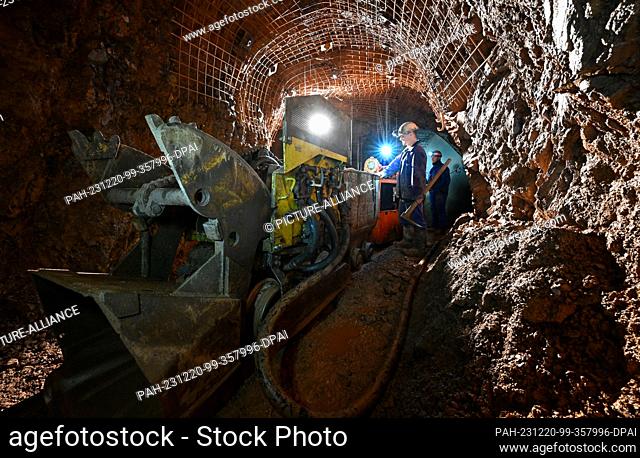 PRODUCTION - 12 December 2023, Saxony, Bad Schlema: Wismut miners rehabilitate a roadway underground on the Markus-Semmler level of the Wismut mine in the Ore...