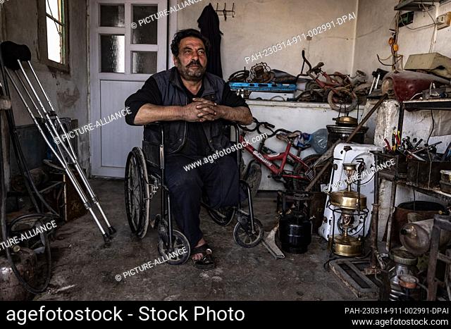 14 March 2023, Syria, Mashhad Ruhin: Ibrahim Khaled, 56, who has lost his feet in an air strike on the city of Marat Al-Numan