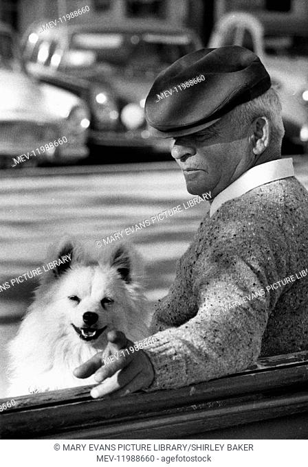 Man and dog on a bench in Le Lavandou, South of France