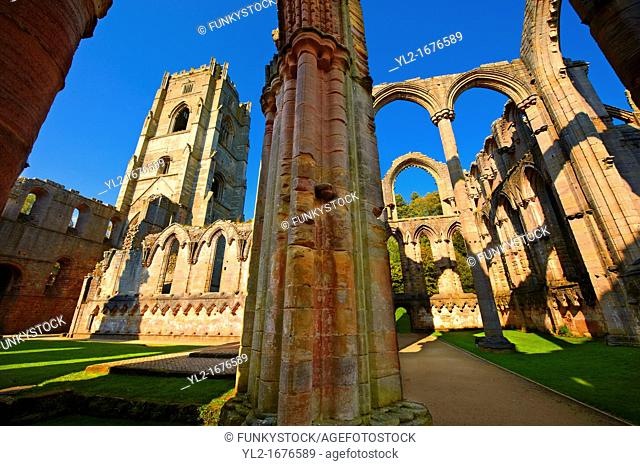 Side chapel & bell tower of Fountains Abbey , founded in 1132, is one of the largest and best preserved ruined Cistercian monasteries in England  The ruined...