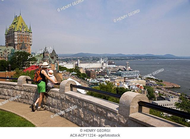 Young mother and daughter enjoy view of Quebec City and St Lawrence River from Citadelle, Quebec, Canada