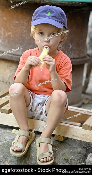 Boy, 4 years, licking ice cream, Stuttgart, Baden-Württemberg, Germany, Europe