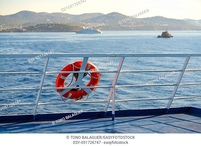 Ferry railing in Ibiza with round buoy at Mediterranean Balearics sea of Spain