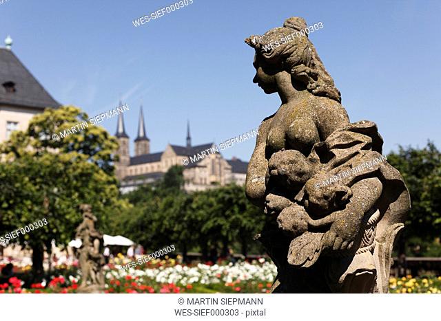 Germany, Bavaria, Franconia, Bamberg, View of rococo figure in the rose garden