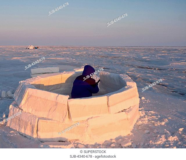 Inupiaq Man Builds an Igloo Snow Blind