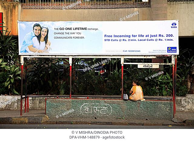 Advertising hording TATA indicom mobile on BEST city bus stop ; P. Ramabai marg ; Grant Road ; Bombay Mumbai ; Maharashtra ; India
