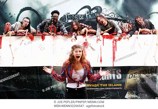 ‘Zombies’ appear in a gory billboard in Shoreditch, London, to mark the arrival of two new The Walking Dead scare mazes at THORPE PARK Resort for its annual...