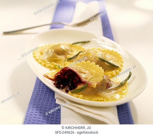 Ravioli with beetroot filling and sage