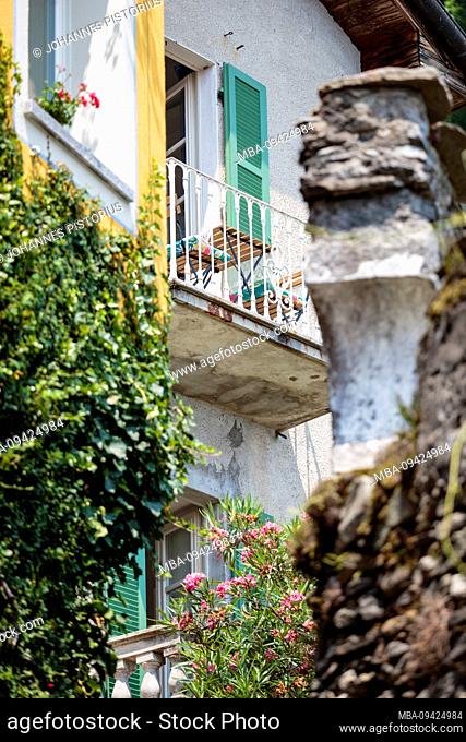 Europe, Italy, Piedmont, Cannero Riviera. Picturesque houses and balconies in the old town near the port