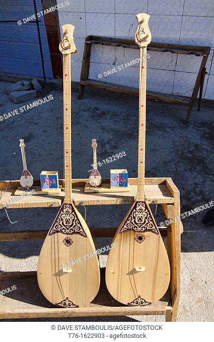 the dombra, a traditional Kazakh string instrument, for sale at the market in Bayan-Ölgii in Western Mongolia