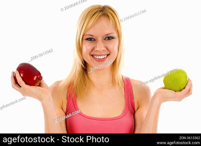 Beautiful Woman holding an red and green apple isolated over a white background
