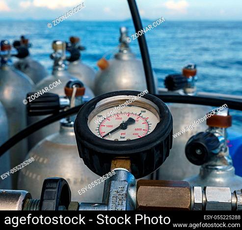 Scuba diving. Pressure meter of oxygen cylinders, close-up
