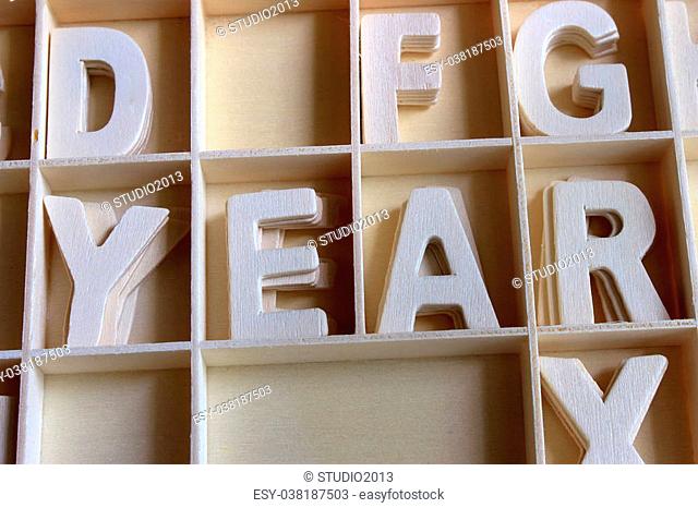 Word year made with wooden letters alphabet