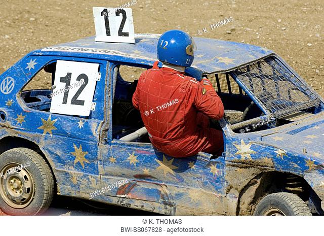 gymkhana car crash race, driver getting out of the car through the window, Austria, Lower Austria, Weinviertel, Hollabrunn