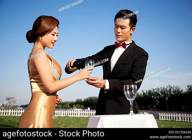 Wearing evening dress fashion of young man and woman in PARTY high quality photo
