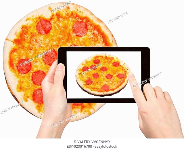 tourist photographs of italian pizza with salami