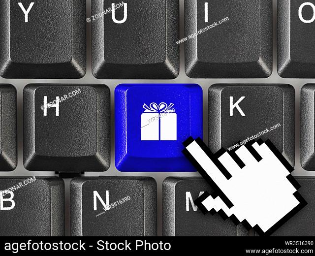 Computer keyboard with gift key - business background
