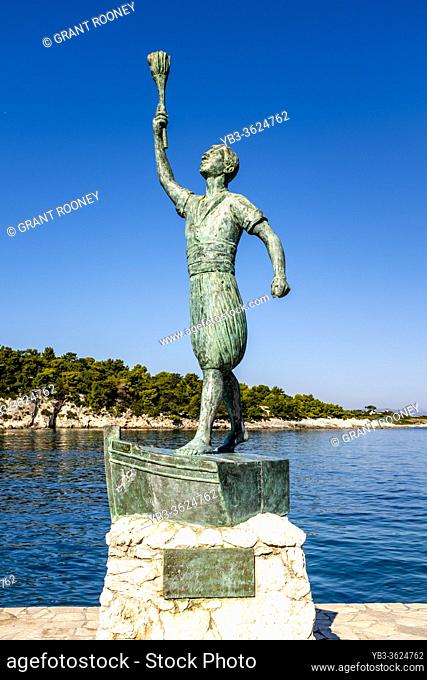 A Statue Near The Harbour At Paxos, Greece