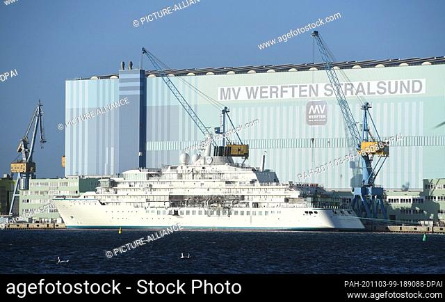 03 November 2020, Mecklenburg-Western Pomerania, Stralsund: Workers are working on the outfitting quay of the MV shipyards in Stralsund on the expedition yacht...