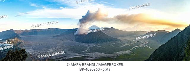 Caldera Tengger, view of volcanoes at sunset, smoking volcano Gunung Bromo, with Mt. Batok, Mt. Kursi, Mt. Gunung Semeru, National Park Bromo-Tengger-Semeru