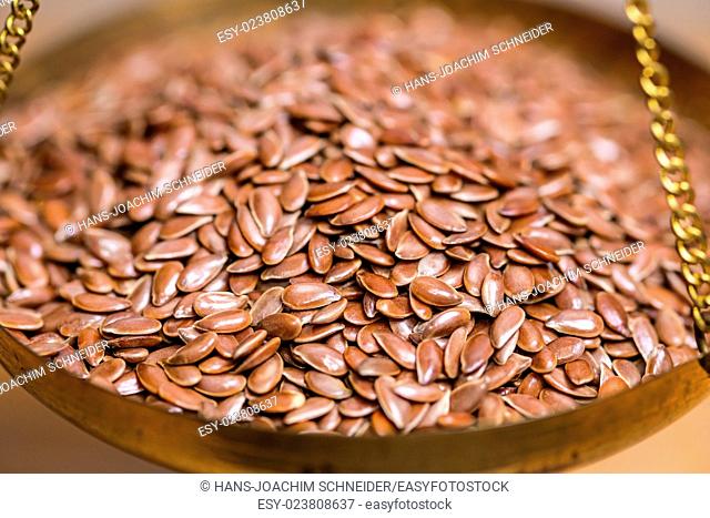 Flax-seeds on a balance