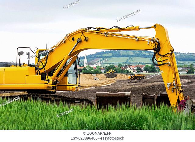 Excavators and other vehicles on construction site