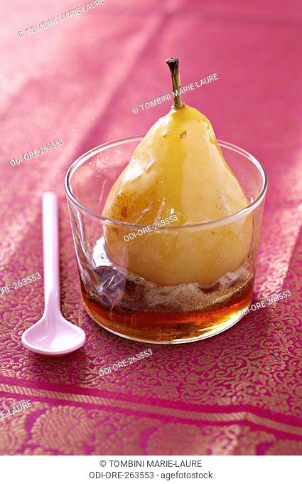 Spices and wine poached pear