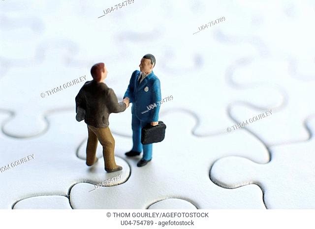 Handshake on puzzle miniature