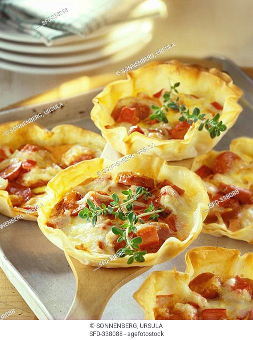 Cabanossi, pepper and cheese tartlets