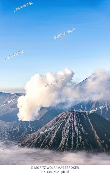 Mount Bromo smoking volcano, Mount Batok, Mount Kursi, Mount Gunung Semeru, Bromo Tengger Semeru National Park, East Java, Indonesia
