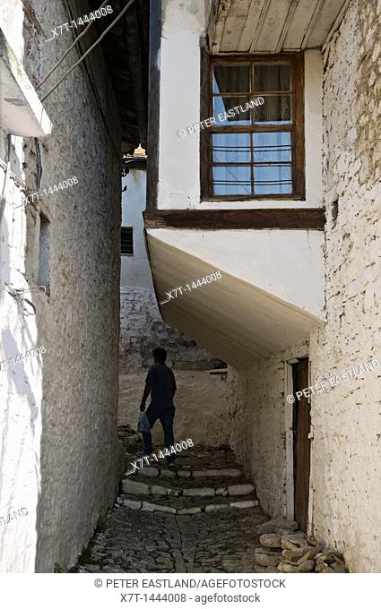A typical narrow alleyway with overhanging, ottoman period, houses in the Mangalemi district of Berat in central Albania